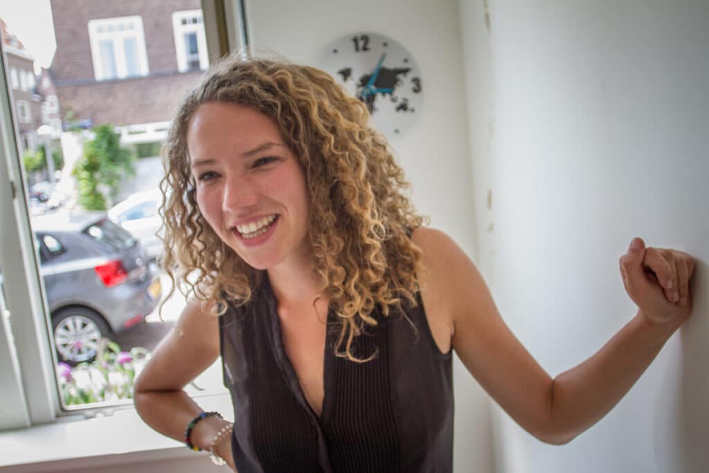 Experienced language teacher engaging with adult learners in Amsterdam