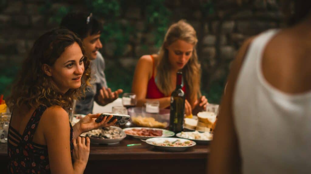 person practicing Spanish with in-law family